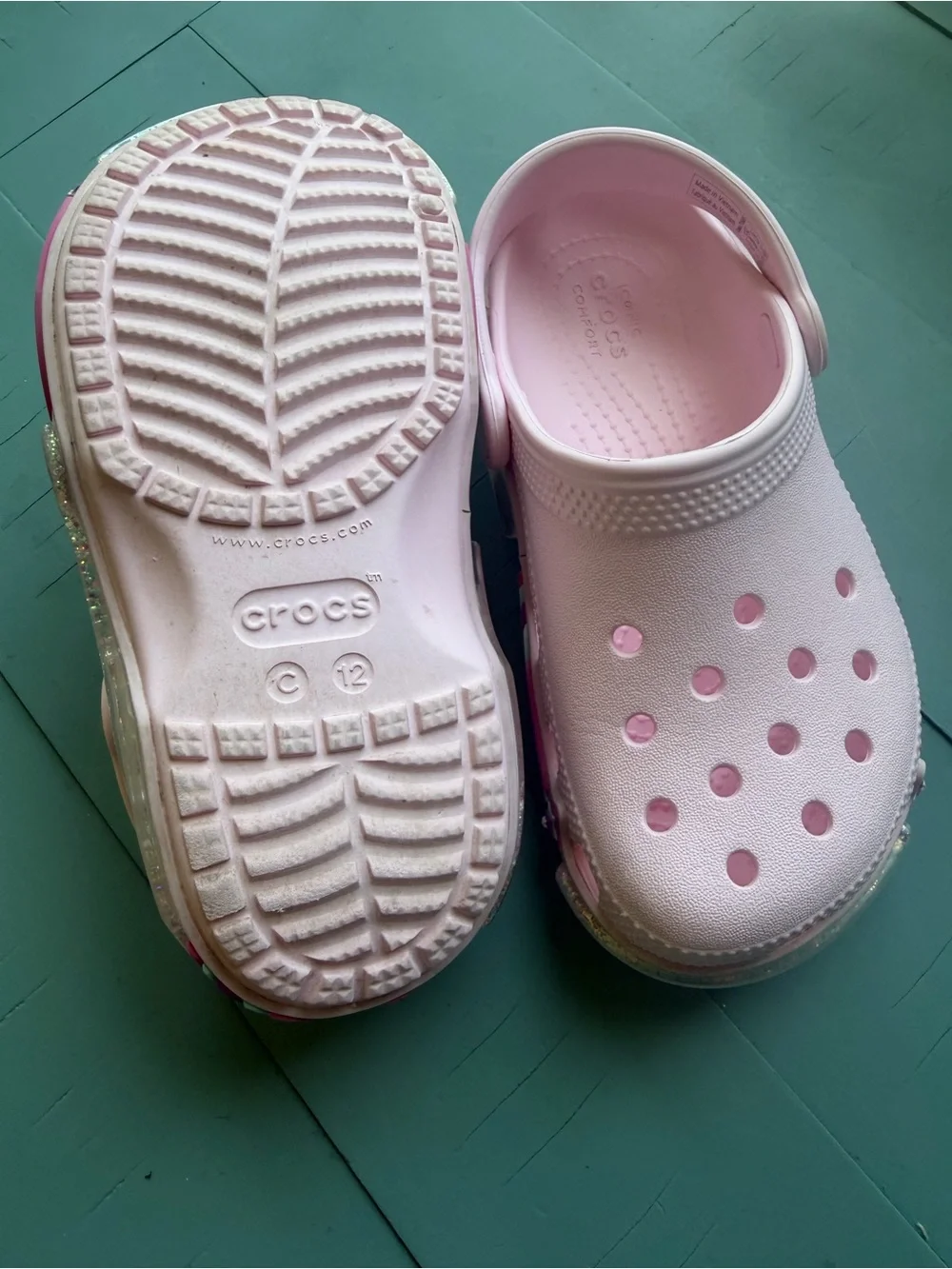 CROCS Kids Light Pink Clog Sandals with Star Heel Accent